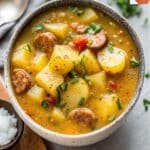 Cajun Potato Soup – Creamy, Spicy, and Ready for Soup Night 5 Cajun Potato Soup with sausage and green onions in a bowl