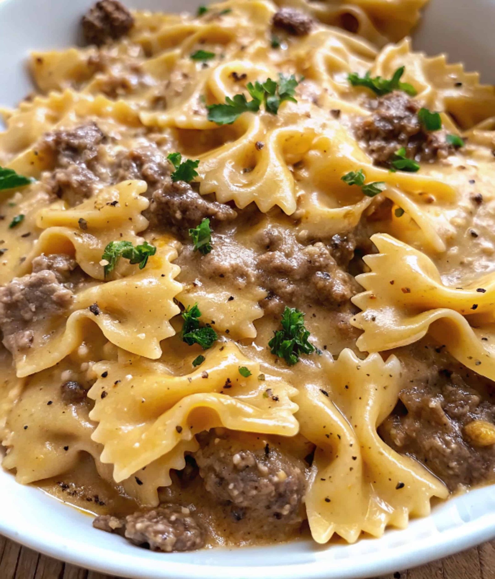 creamy parmesan garlic beef bowtie pasta with ground beef