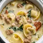 Crockpot Cheese Tortellini and Sausage in creamy tomato sauce
