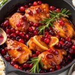 Skillet Cranberry Orange Chicken – Easy, Juicy, and Festive 5 killet Cranberry Orange Chicken with cranberries and orange slices