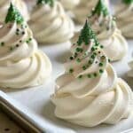Airy Christmas Tree Meringues: Delightfully Crisp Holiday Cookies Airy Christmas Tree Meringues Airy Christmas Tree Meringues arranged on parchment with star sprinkles