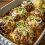 Amish Hamburger Steak Bake with golden cheese topping