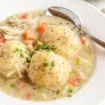 Creamy homemade chicken and dumplings recipe with fluffy dumplings