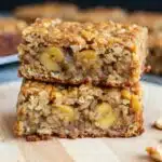 energizing banana oatmeal bars stacked on board