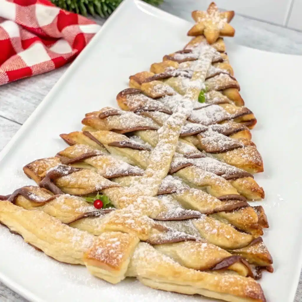 Serving Nutella puff pastry Christmas tree dessert
